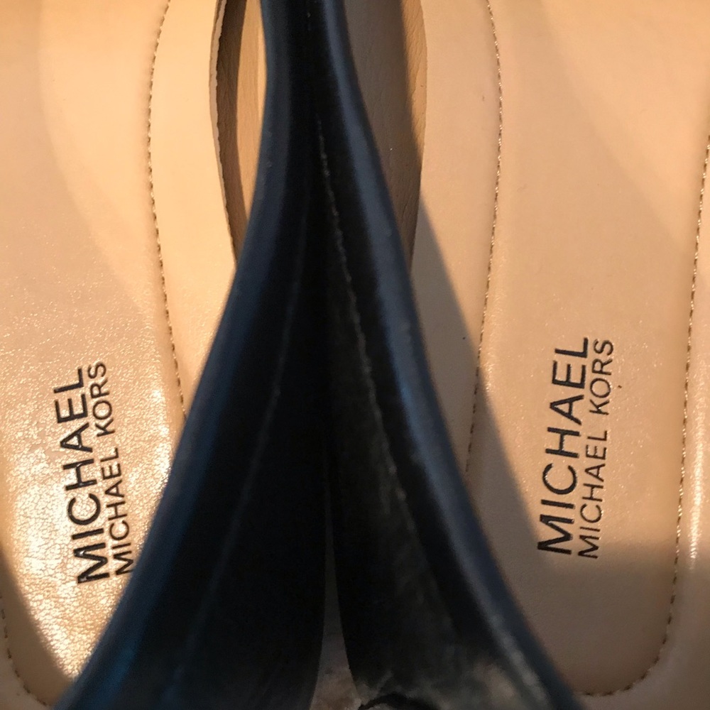 Black Michael Kors loafers.